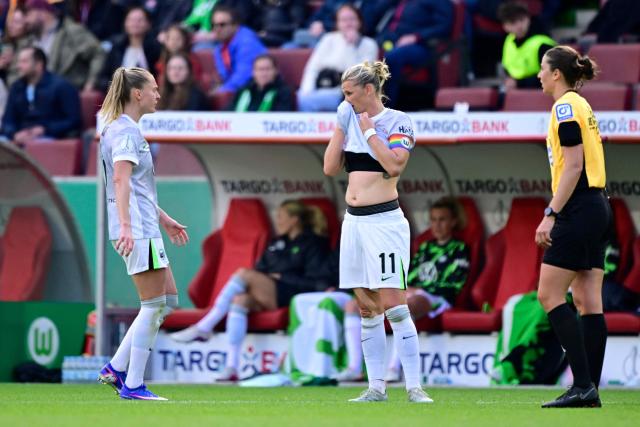 VfL Wolfsburg's German forward #11 Alexandra Popp (C) reacts during the Women's German Cup (DFB-Pokal) final football match between VfL Wolfsburg and FC Bayern Munich in Cologne, western Germany, on Mai 14, 2026. (Photo by INA FASSBENDER / AFP) / DFB REGULATIONS PROHIBIT ANY USE OF PHOTOGRAPHS AS IMAGE SEQUENCES AND QUASI-VIDEO.