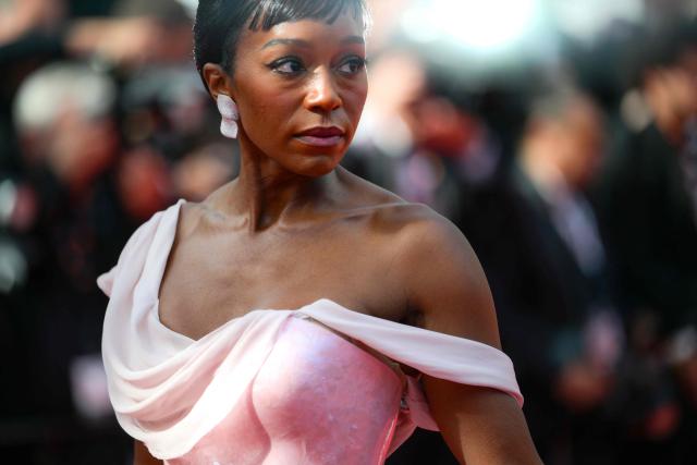 US actress and model Aja Naomi King poses as she arrives for the screening of the film "Fatherland" at the 79th edition of the Cannes Film Festival in Cannes, southern France on May 14, 2026. (Photo by Olivier CHASSIGNOLE / AFP)