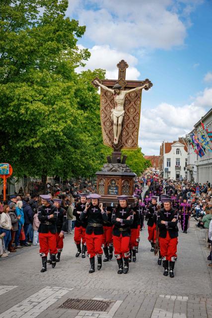 Participants take part in the Procession of the Holy Blood (Heilig Bloedprocessie) through the historic city centre of Bruges on May 14, 2026. The procession, created in 1304 as an expression of gratitude and faith, is held every year on Ascension Day and carries the relic of the Holy Blood through the streets of Bruges. (Photo by KURT DESPLENTER / Belga / AFP) / Belgium OUT