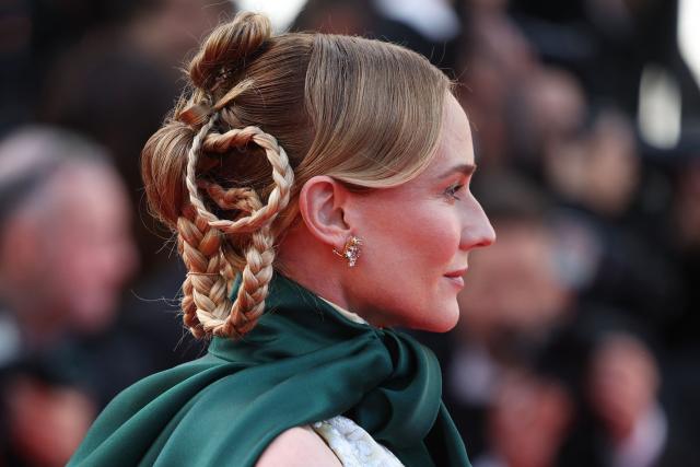 German actress Diane Kruger arrives for the screening of the film "Fatherland" at the 79th edition of the Cannes Film Festival in Cannes, southern France on May 14, 2026. (Photo by Valery HACHE / AFP)
