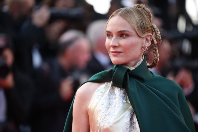 German actress Diane Kruger arrives for the screening of the film "Fatherland" at the 79th edition of the Cannes Film Festival in Cannes, southern France on May 14, 2026. (Photo by Valery HACHE / AFP)