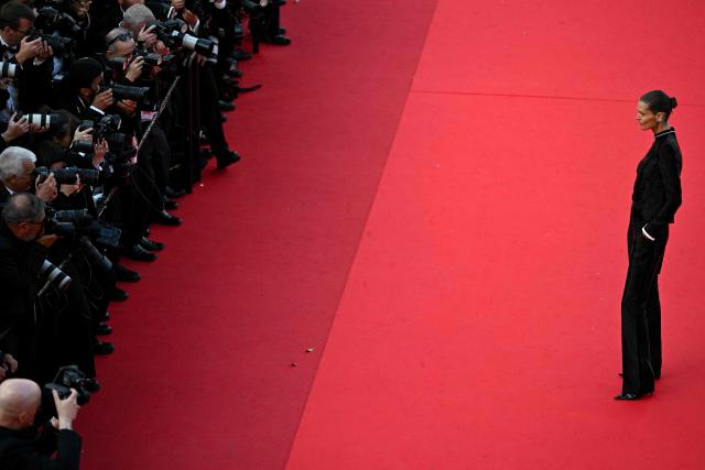 Polish model and actress Malgosia Bela poses as she arrives for the screening of the film "Fatherland" at the 79th edition of the Cannes Film Festival in Cannes, southern France on May 14, 2026. (Photo by Antonin THUILLIER / AFP)