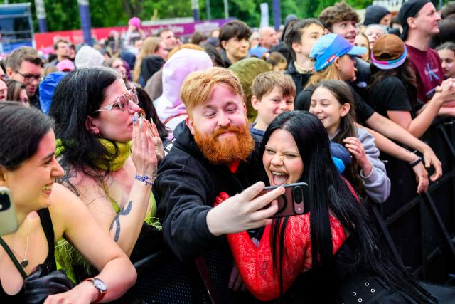 Maltese singer Miriana Conte, who represented Malta in the 2025 Eurovision Song Contest, poses with fans at the fan area in front of the City Hall in Vienna on May 14, 2026, prior to the second semi-final of the Eurovision Song Contest (ESC). (Photo by MAX SLOVENCIK / APA / AFP) / Austria OUT