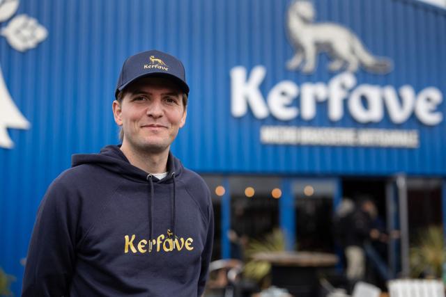 Journalist and far-right activist Erik Tegner poses during the opening of his Kerfave brewery in Pleguien, western France on May 14, 2026. Tegner, a commentator on CNews television and co-founder of the far-right outlet Frontières, opened the Kerfave craft brewery alongside a business partner in the Cotes-d'Armor department, with anti-fascist groups mobilising against the launch. (Photo by Fred TANNEAU / AFP)