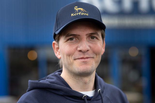 Journalist and far-right activist Erik Tegner poses during the opening of his Kerfave brewery in Pleguien, western France on May 14, 2026. Tegner, a commentator on CNews television and co-founder of the far-right outlet Frontières, opened the Kerfave craft brewery alongside a business partner in the Cotes-d'Armor department, with anti-fascist groups mobilising against the launch. (Photo by Fred TANNEAU / AFP)