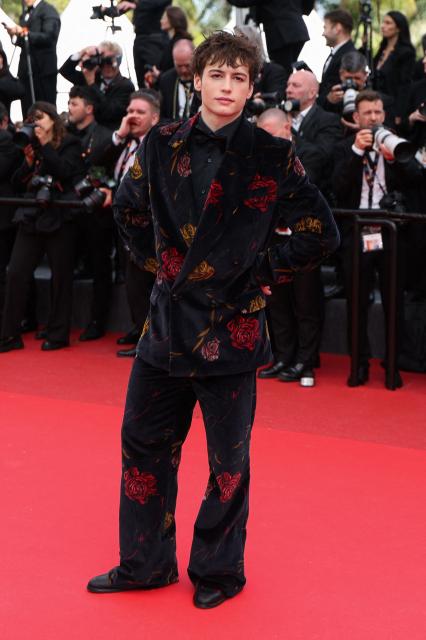 French influencer Bach Buquen arrives for the screening of the film "Fatherland" at the 79th edition of the Cannes Film Festival in Cannes, southern France on May 14, 2026. (Photo by Sameer AL-DOUMY / AFP)