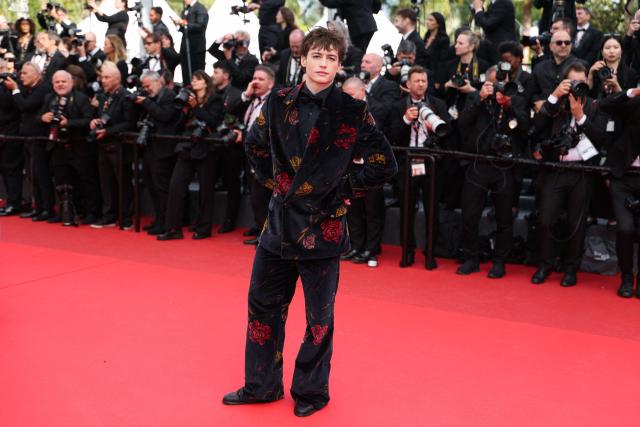 French influencer Bach Buquen arrives for the screening of the film "Fatherland" at the 79th edition of the Cannes Film Festival in Cannes, southern France on May 14, 2026. (Photo by Sameer AL-DOUMY / AFP)