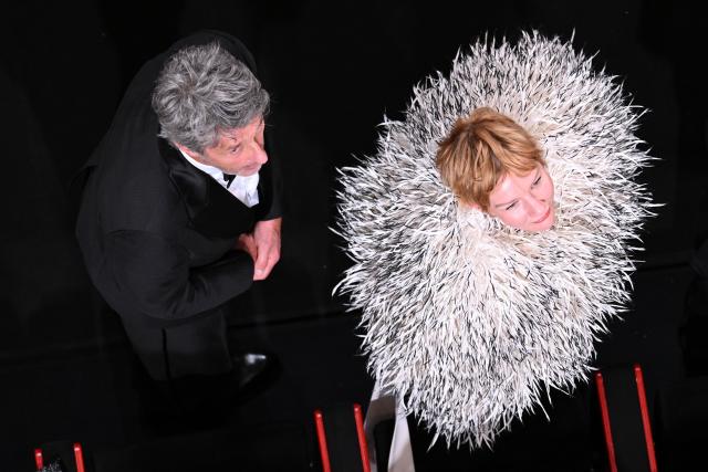 (From L) Polish writer Pawel Pawlikowski and German actress Sandra Hueller arrive for the screening of the film "Fatherland" at the 79th edition of the Cannes Film Festival in Cannes, southern France on May 14, 2026. (Photo by Antonin THUILLIER / AFP)