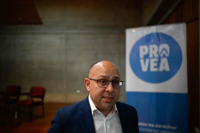 Human rights activist and general coordinator of the NGO Provea, Oscar Murillo, speaks to the press before the presentation of the organization’s 2026 annual report on human rights in Venezuela, in Caracas, on May 14, 2026. (Photo by Federico PARRA / AFP)