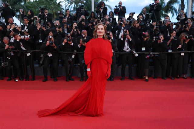 French actress Isabelle Huppert arrives for the screening of the film "Histoires Paralleles" (Parallel Tales) at the 79th edition of the Cannes Film Festival in Cannes, southern France on May 14, 2026. (Photo by Sameer AL-DOUMY / AFP)