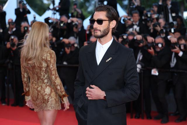 French actor Pierre Niney arrives for the screening of the film "Histoires Paralleles" (Parallel Tales) at the 79th edition of the Cannes Film Festival in Cannes, southern France on May 14, 2026. (Photo by Sameer AL-DOUMY / AFP)