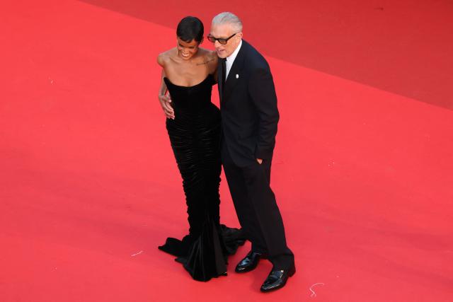 French actor Vincent Cassel and his partner Brazilian model Narah Baptista arrive for the screening of the film "Histoires Paralleles" (Parallel Tales) at the 79th edition of the Cannes Film Festival in Cannes, southern France on May 14, 2026. (Photo by Thibaud MORITZ / AFP)