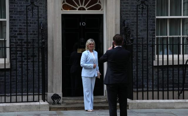 Czech First Lady Eva Pavlova poses for a photo outside the door to 10 Downing Street in central London on May 14, 2026 after attending a the Summit of First Ladies and Gentlemen Global Platform, as part of the UK and Ukraine's 100 Year Partnership. (Photo by CARLOS JASSO / AFP)