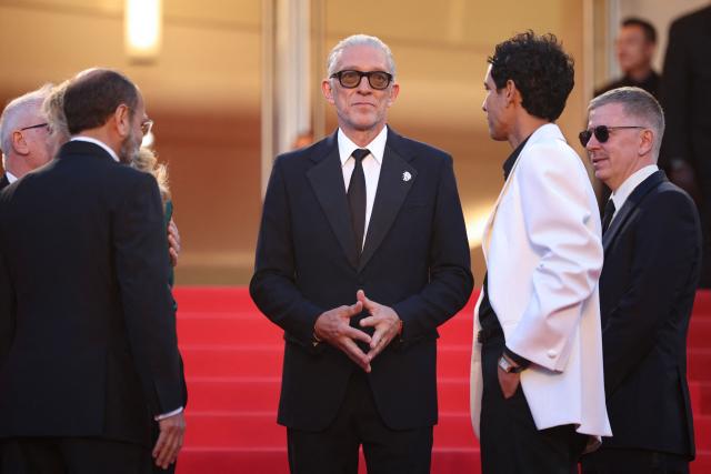 French actor Vincent Cassel arrives for the screening of the film "Histoires Paralleles" (Parallel Tales) at the 79th edition of the Cannes Film Festival in Cannes, southern France on May 14, 2026. (Photo by Valery HACHE / AFP)