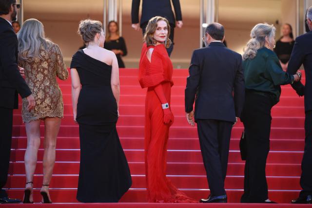 French actress Isabelle Huppert arrives for the screening of the film "Histoires Paralleles" (Parallel Tales) at the 79th edition of the Cannes Film Festival in Cannes, southern France on May 14, 2026. (Photo by Valery HACHE / AFP)