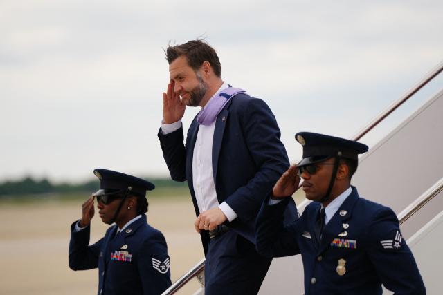 Vice President JD Vance disembarks Air Force Two at Joint Base Andrews, Maryland on May 14, 2026. Vance traveled to Bangor, Maine to give remarks on the Trump administration's efforts to combat fraud. (Photo by Tierney L CROSS / POOL / AFP)