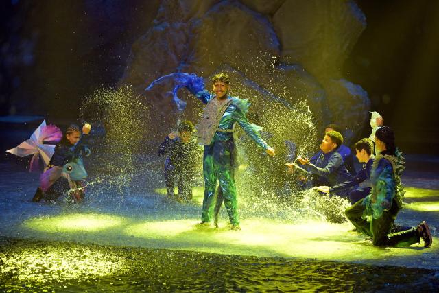 Kuwaiti artists perform during the 'Waterland' show at the Kuwait Sports Club Aquatic Complex in Kaifan, Kuwait City on May 14, 2026. Waterland is a youth-focused musical entertainment production presented in a water-based environment. (Photo by YASSER AL-ZAYYAT / AFP)