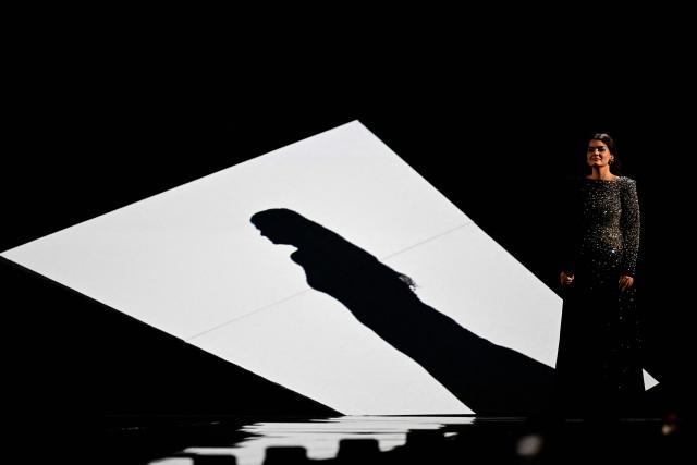 Latvian singer Liene Atvara, aka Atvara and representing Latvia with the song 'Ena', performs during the second semi-final of the Eurovision Song Contest 2026 (ESC) at Wiener Stadthalle in Vienna, Austria on May 14, 2026. (Photo by Tobias SCHWARZ / AFP)