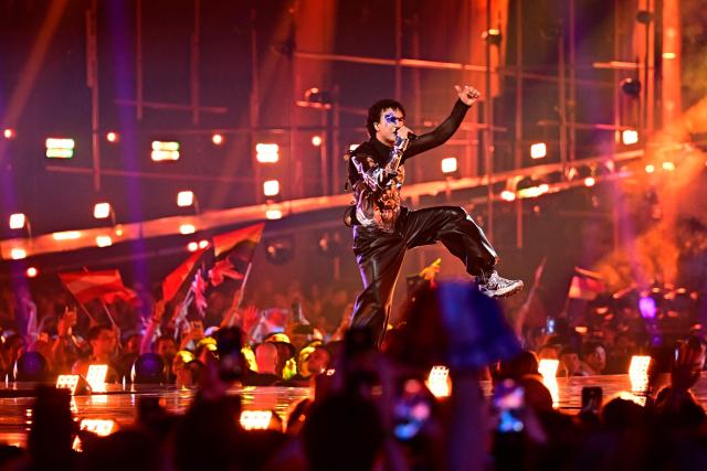 Austrian singer Benjamin Gedeon, aka Cosmo and representing Austria with the song 'Tanzschein', performs during the second semi-final of the Eurovision Song Contest 2026 (ESC) at Wiener Stadthalle in Vienna, Austria on May 14, 2026. (Photo by Tobias SCHWARZ / AFP)