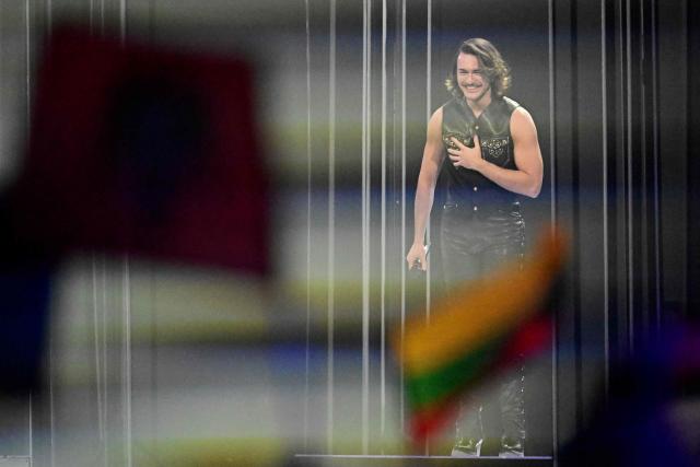 Maltese singer Aidan Cassar, aka Aidan and representing Malta with the song 'Bella', reacts after his performance during the second semi-final of the Eurovision Song Contest 2026 (ESC) at Wiener Stadthalle in Vienna, Austria on May 14, 2026. (Photo by Tobias SCHWARZ / AFP)