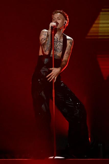 Norwegian singer Jonas Lovv, representing Norway with the song 'Ya Ya Ya', performs during the second semi-final of the Eurovision Song Contest 2026 (ESC) at Wiener Stadthalle in Vienna, Austria on May 14, 2026. (Photo by Tobias SCHWARZ / AFP)