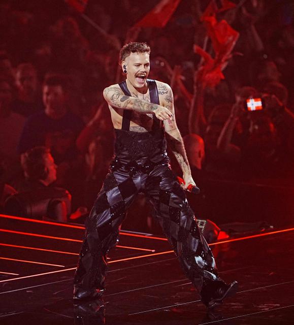Jonas Norwegian singer Jonas Lovv, representing Norway with the song 'Ya Ya Ya', performs during the second semi-final of the Eurovision Song Contest 2026 (ESC) at Wiener Stadthalle in Vienna, Austria on May 14, 2026. (Photo by GEORG HOCHMUTH / APA / AFP) / Austria OUT