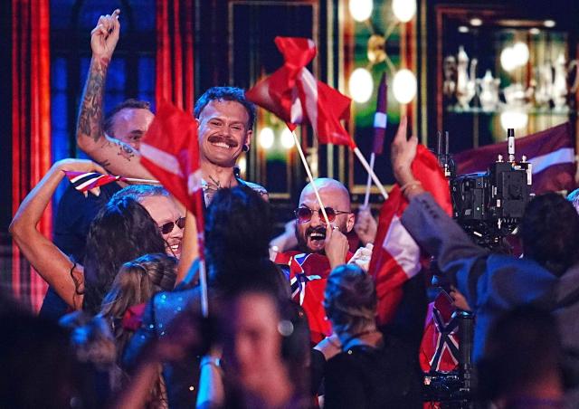 Jonas Norwegian singer Jonas Lovv, representing Norway with the song 'Ya Ya Ya', celebrates after having been voted into the final after his performance during the second semi-final of the Eurovision Song Contest 2026 (ESC) at Wiener Stadthalle in Vienna, Austria on May 14, 2026. (Photo by GEORG HOCHMUTH / APA / AFP) / Austria OUT
