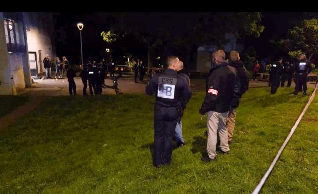 This video screen grab shows police officers at the scene of a shooting in Nantes, France, on May 14, 2026, where a 15-year-old was killed and two minors were injured. (Photo by AFP)