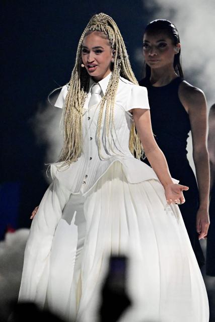 Monroe Vata Rigby aka Monroe and representing France with the song 'Regarde !' performs during the second semi-final of the Eurovision Song Contest 2026 (ESC) at Wiener Stadthalle in Vienna, Austria on May 14, 2026. (Photo by Tobias SCHWARZ / AFP)