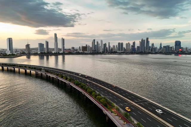 Aerial view of the Cinta Costera beltway with the skyline of Panama City in the background taken on May 14, 2026. (Photo by Martin BERNETTI / AFP)