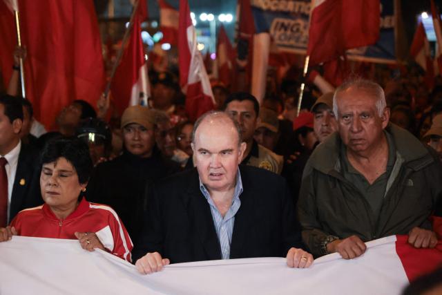 Peru's presidential candidate for the Renovacion Popular party, Rafael Lopez Aliaga, leads a rally to protest alleged irregularities in the recent elections in Lima on May 14, 2026. (Photo by Connie FRANCE / AFP)