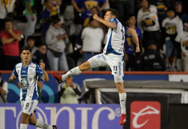 Pachuca's Moroccan forward #11 Oussama Idrissi celebrates after scoring the opening goal during the Liga MX Clausura semifinal first-leg football match between Pachuca and Pumas in Pachuca, Mexico on May 14, 2026. (Photo by Alfredo ESTRELLA / AFP)