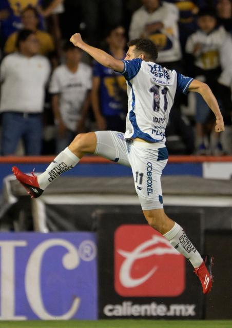 Pachuca's Moroccan forward #11 Oussama Idrissi celebrates after scoring the opening goal during the Liga MX Clausura semifinal first-leg football match between Pachuca and Pumas in Pachuca, Mexico on May 14, 2026. (Photo by Alfredo ESTRELLA / AFP)