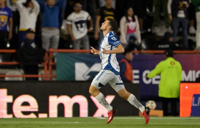 Pachuca's Moroccan forward #11 Oussama Idrissi celebrates after scoring the opening goal during the Liga MX Clausura semifinal first-leg football match between Pachuca and Pumas in Pachuca, Mexico on May 14, 2026. (Photo by Alfredo ESTRELLA / AFP)