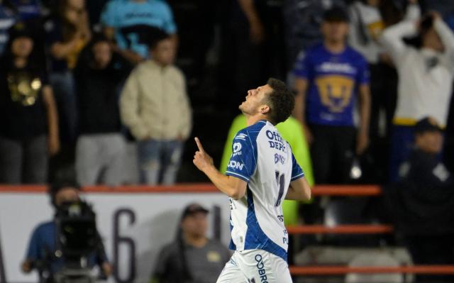 Pachuca's Moroccan forward #11 Oussama Idrissi celebrates after scoring the opening goal during the Liga MX Clausura semifinal first-leg football match between Pachuca and Pumas in Pachuca, Mexico on May 14, 2026. (Photo by Alfredo ESTRELLA / AFP)