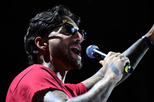 Colombian singer Maluma performs on stage during the launch of his new album 'Loco x Volver' in Medellin, Colombia on May 14, 2026. (Photo by Jaime SALDARRIAGA / AFP)