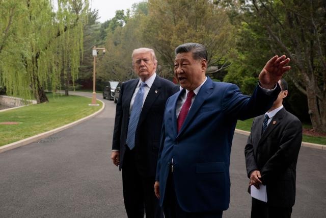 China’s President Xi Jinping (R) gestures as he meets with US President Donald Trump (L) during a visit to Zhongnanhai Garden in Beijing on May 15, 2026. (Photo by Evan Vucci / POOL / AFP)