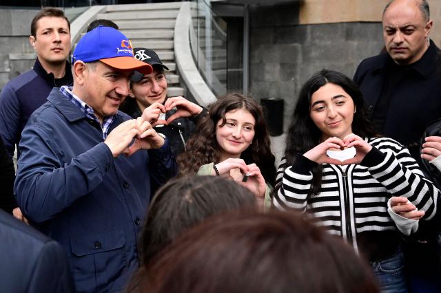 Armenian Prime Minister Nikol Pashinyan meets with people in the town of Gyumri on April 19, 2026. (Photo by KAREN MINASYAN / AFP)