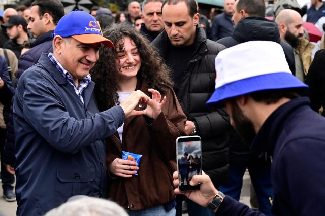 Armenian Prime Minister Nikol Pashinyan meets with people in the town of Gyumri on April 19, 2026. (Photo by KAREN MINASYAN / AFP)