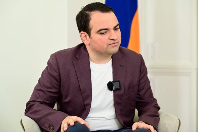 Narek Karapetyan, nephew of arrested Armenian billionaire opposition leader Samvel Karapetyan, talks to AFP reporters in Yerevan on April 22, 2026. (Photo by KAREN MINASYAN / AFP)