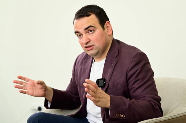 Narek Karapetyan, nephew of arrested Armenian billionaire opposition leader Samvel Karapetyan, talks to AFP reporters in Yerevan on April 22, 2026. (Photo by KAREN MINASYAN / AFP)