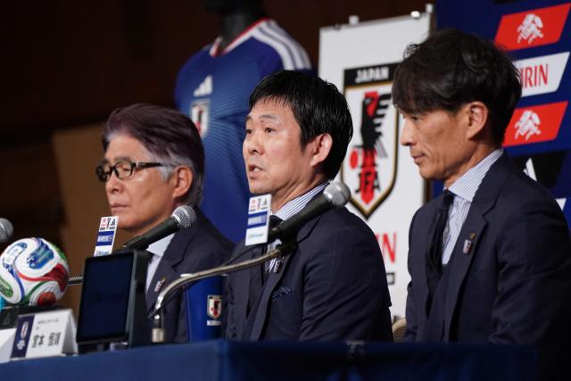 Japan's national football team head coach Hajime Moriyasu (C) announces the members of Japan's 2026 World Cup squad during a press conference at a hotel in Tokyo on May 15, 2026. (Photo by Kazuhiro NOGI / AFP)