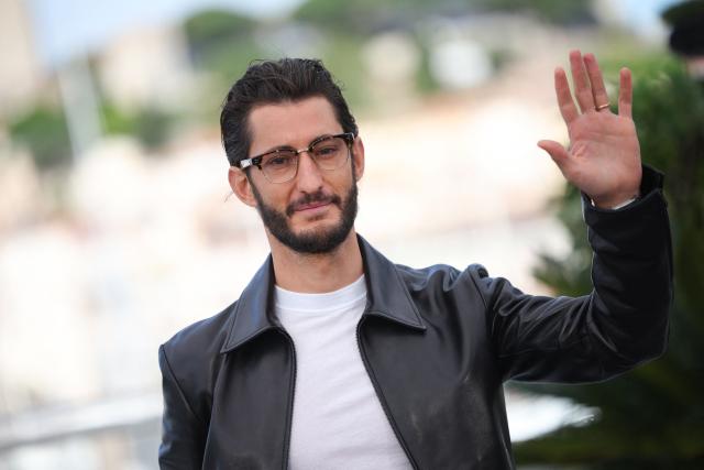 French actor Pierre Niney poses during a photocall of the film "Histoires Paralleles" (Parallel Tales) at the 79th edition of the Cannes Film Festival in Cannes, southern France on May 15, 2026. (Photo by Valery HACHE / AFP)