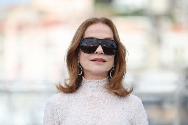 French actress Isabelle Huppert poses during a photocall of the film "Histoires Paralleles" (Parallel Tales) at the 79th edition of the Cannes Film Festival in Cannes, southern France on May 15, 2026. (Photo by Valery HACHE / AFP)