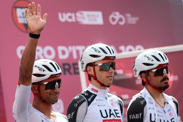 UAE Team Emirates - XRG Ecuadorian rider Jhonatan Narvaez (L) waves during the presentation prior the 7th stage of the Giro d'Italia 2026 - Tour of Italy cycling race between Formia and Blockhaus, Italy, on May 15, 2026. (Photo by Luca Bettini / AFP)