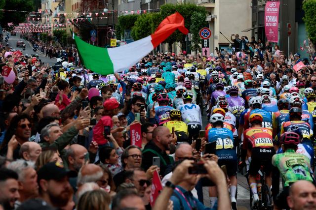 The pack rides to the start line of the 7th stage of the Giro d'Italia 2026 - Tour of Italy cycling race between Formia and Blockhaus, Italy, on May 15, 2026. (Photo by Luca Bettini / AFP)