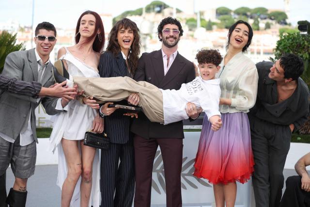 (From 2ndL) US model Alaska Riley, British model Cara Delevingne, US director and screenwriter Jordan Firstman, British actor Reggie Absolom, US actress Miss Benny and Mexican actor Diego Calva pose during a photocall of the film "Club Kid" at the 79th edition of the Cannes Film Festival in Cannes, southern France on May 15, 2026. (Photo by Valery HACHE / AFP)