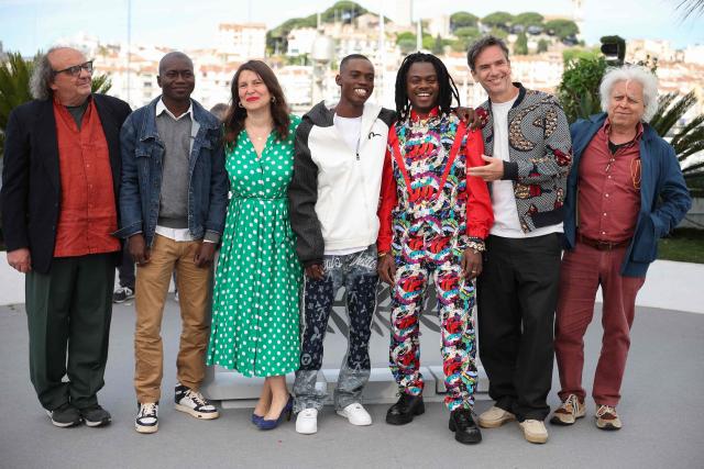 (From L) Italian Producer Daniele Incalcaterra, Central African Republic Director Elvis Sabin Ngaibino, French producer Caroline Nataf, Central African Republic actor Bradley Fiomona Dembeasset, Central African Republic director and screenwriter Rafiki Fariala, French film producer Boris Lojkine and Chilean film producer Marco Bechis  pose during a photocall of the film "Congo Boy" at the 79th edition of the Cannes Film Festival in Cannes, southern France on May 15, 2026. (Photo by Valery HACHE / AFP)