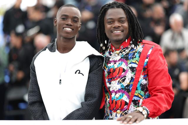 Central African Republic actor Bradley Fiomona Dembeasset (L) and Central African Republic director and screenwriter Rafiki Fariala pose during a photocall of the film "Congo Boy" at the 79th edition of the Cannes Film Festival in Cannes, southern France on May 15, 2026. (Photo by Sameer AL-DOUMY / AFP)