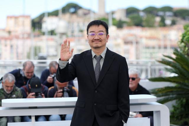 South Korean director Yeon Sang-Ho poses during a photocall of the film "Gun-Che" (Colony) at the 79th edition of the Cannes Film Festival in Cannes, southern France on May 15, 2026. (Photo by Thibaud MORITZ / AFP)